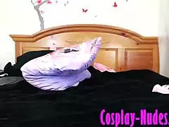 Sexy cosplay girl undresses and masturbates