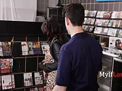 Busty milf surprises blockbuster employee with spontaneous oral action