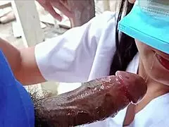 Nurse and Laborer Play at Construction Site