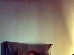 Random homemade video of amateurs relaxing in bed vertically