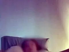 Random homemade video of amateurs relaxing in bed vertically