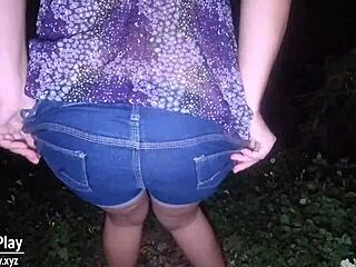 Hey, wanna see this hot milf peeing right on a public street?