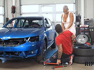In the garage, the swanky woman with big tits rims her husband to relax him