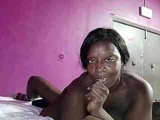 Thick African American rides cowgirl in backroom with shaven pussy.