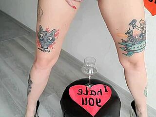 DOMINATRIX NIKA MISTRESS HUMILIATES WITH GOLDEN RAIN COCKTAIL