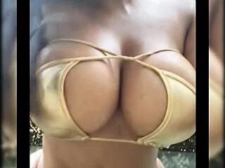 Hot babe flaunting huge tits in pool bikini?