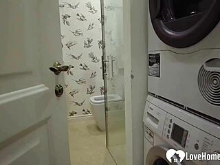 This alluring redhead in the bathroom gives an amazing blowjob to the old guy