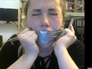 Bound British pornstar Misha Mayfair's mouth packed with cock, gagging in homemade bondage sex tape