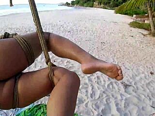 shibari on public beach with lordshibarifloripa