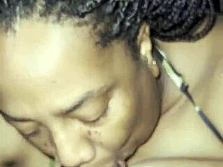 She grabs his fat cock and sucks it hard with her big tits bouncing in the amateur blowjob