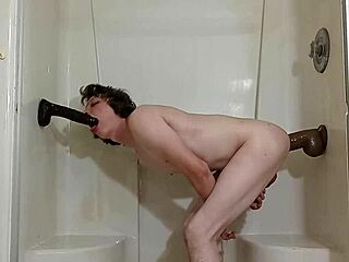 Slipping two thick black dildos deep into my tight holes for intense pleasure