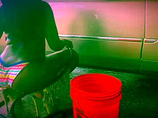 Ebony stripper rips clothes at car wash in Dallas.