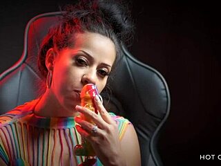 Watch this sexy latina suck a huge dick lollipop and make you cum with dirty talk!