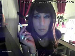 This goth tranny chills, smokes, and strokes her cock really sexy on webcam.