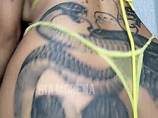 Tattooed Brazilian Babe Sensually Shows Off Her Body