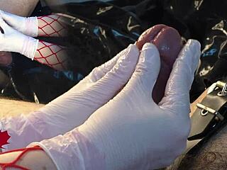 Mistress uses white gloves to masturbate my cock and dilator for cum.