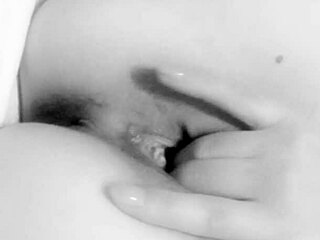 busty milf caresses herself to orgasm close-up