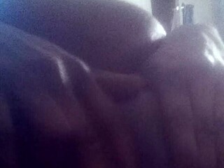 this shaved ebony girl is squirting so wetly