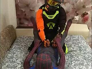 spiderman meets biker for a steamy gay encounter in spandex.