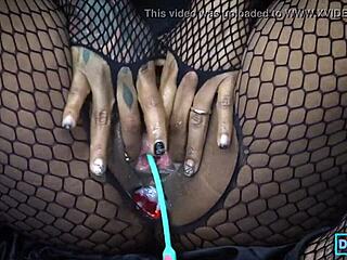 kinky queen dark dea masturbates tattooed black body with pierced tits big ass and hot creaming pussy to orgasm