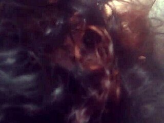 Latina Woman in Glasses Swallows