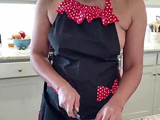 Kara prepares chicken wings in the kitchen