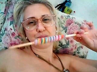 Blonde Milf Stella Still Sucks on a Delicious Lollipop with Intense Passion