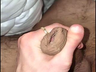 Italian amateur girlfriend gives morning handjob to wake boyfriend with close-up action.