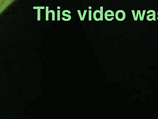 African woman poses in a bent over position for the camera.