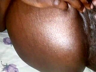 i'm soo turned on by ebony charry ray's sensual seduction, rubbing her thighs and big ass while playing with her shaved pussy for your pleasure