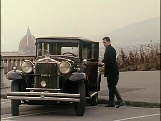 this wonderful redhead is giving a blowjob and getting a cumshot from the man.