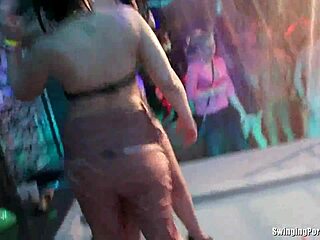 wet party lesbians feel intense pleasure fingering each other at night club orgy