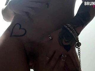 Athletic Brazilian cowgirl flaunts her tail while riding with silicone big tits.