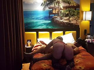 Peruvian Woman in Red Corset with Her Partner