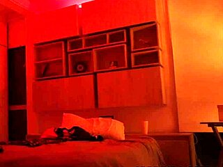 Linda Houston starts dancing in the red light, flaunting her big Latina ass and natural tits.