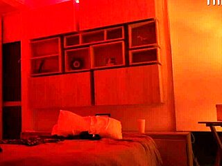 Linda Houston starts dancing in the red light, flaunting her big Latina ass and natural tits.