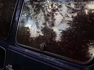 Sexy blonde girl nude in car at midnight, showing hairy tits outdoors