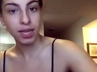 Kat shows off her big tits in this casual scene.