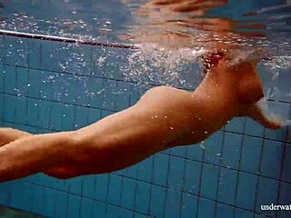 Petite Russian Babe Deniska Swims in Pool