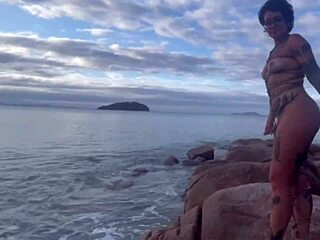 Anomaly Dark in shibari bondage with small tits exposed