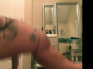 Watch this sexy big booty tattooed chick twerking her ass for you