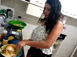 Sarah Rosa cooks a sexy hamburger in the kitchen with her big tits out