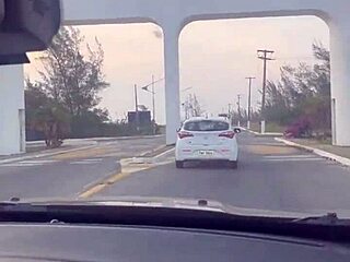 talented woman performs oral skills while driving