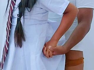 This teen couple has hot sex at a party, wearing uniforms and popping balloons.