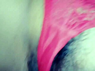 showing my wife in her red thong at home