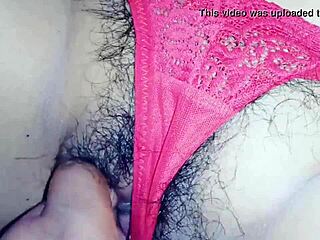 showing my wife in her red thong at home