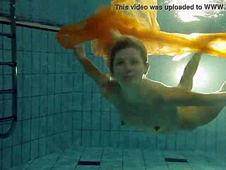 Nastya strips her clothes and shows naked hot body in the pool