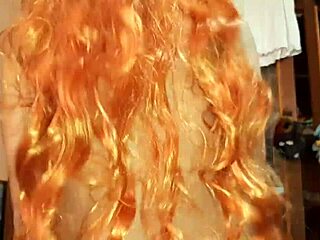 Fucked my redhead girl with strapon on bed