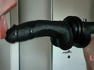 Blonde deepthroats dildo making her shaved pussy wet with toys