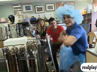 girl in monofins swimming while topless for some cash